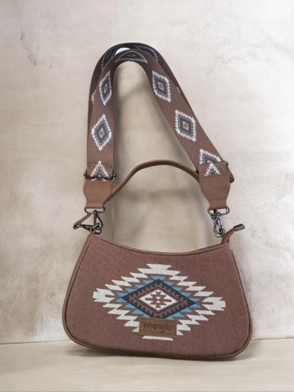 Tan Aztec print Wrangler shoulder bag with adjustable crossbody strap. NWOT